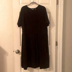Black short-sleeved knit dress.